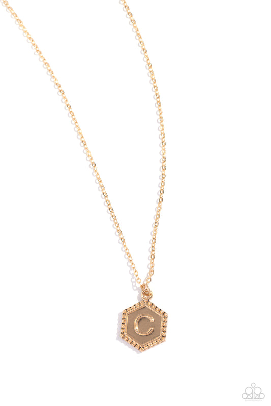 Emblematic Elegance - Gold - C Necklace - Paparazzi - Dare2bdazzlin N Jewelry